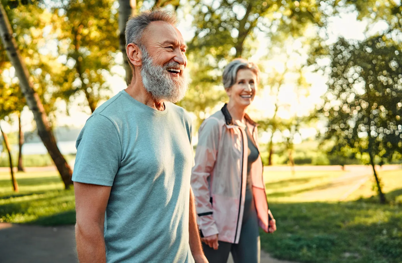 Older adult walking outdoors